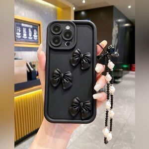 Sleek Black Bow iPhone 16 Pro Max Case with Pearl Strap